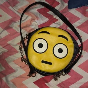 Straight face emoji off shoulder purse .